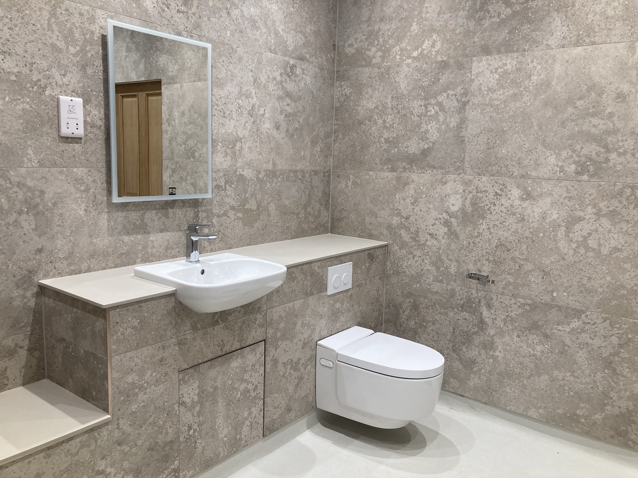 Accessible bathroom with specialist sanitaryware at Carlton Drive
